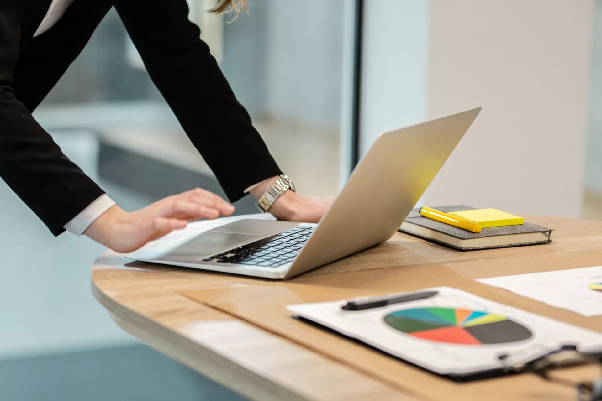 market researcher creating presentation on laptop to make insights actionable