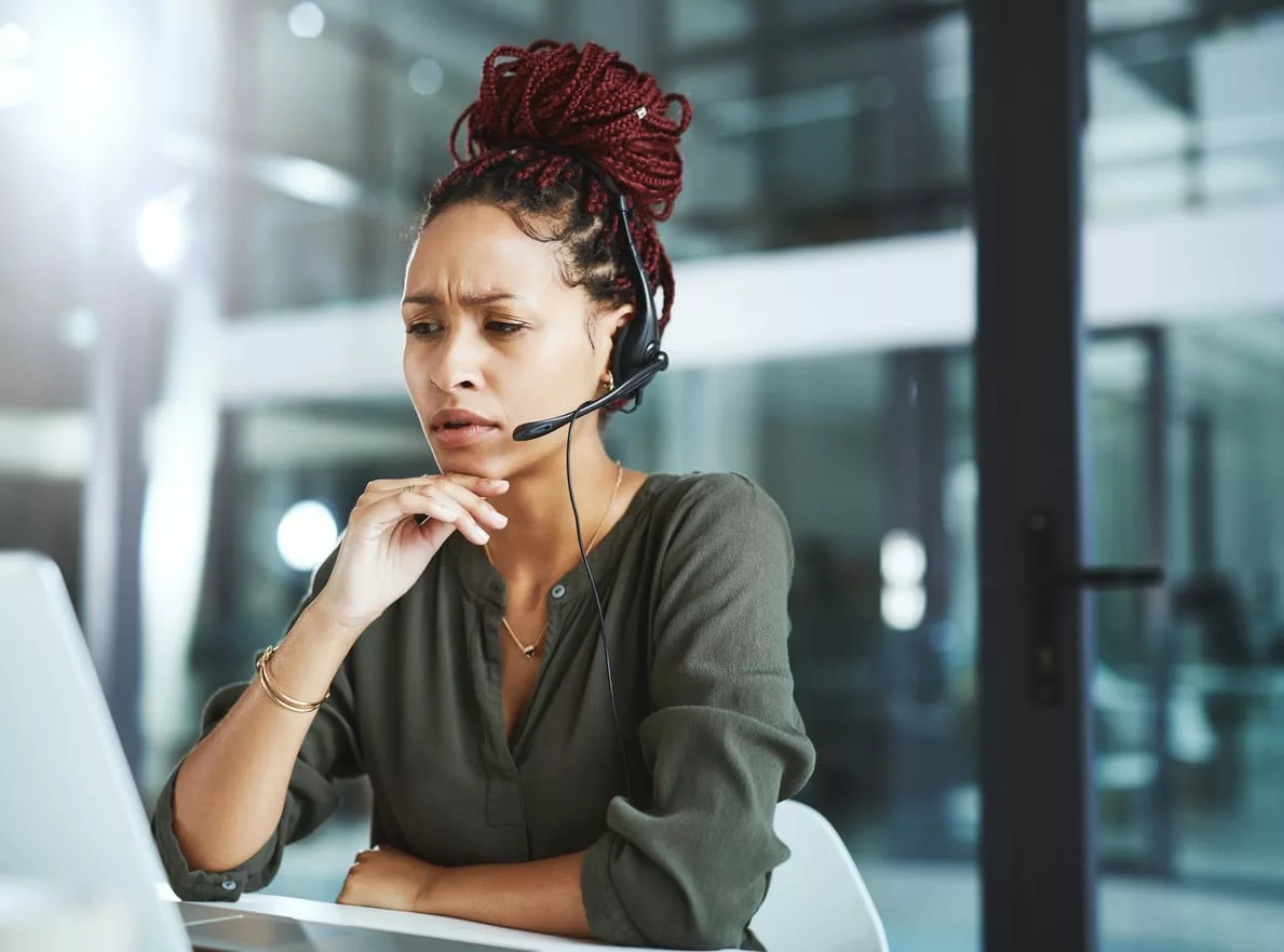 customer service rep working on how to improve the customer experience in your call center