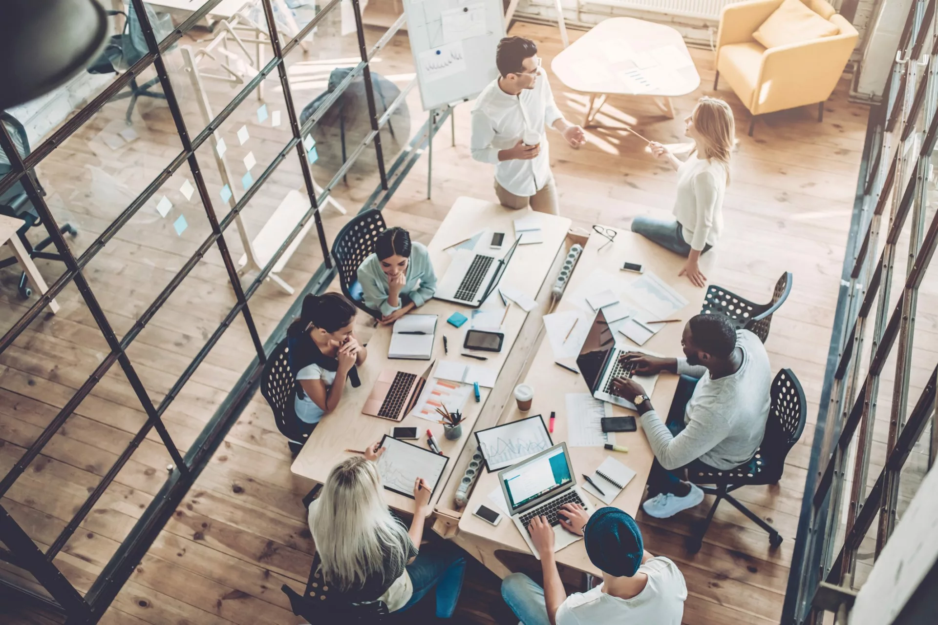 coworkers meeting to discuss employee and customer experience