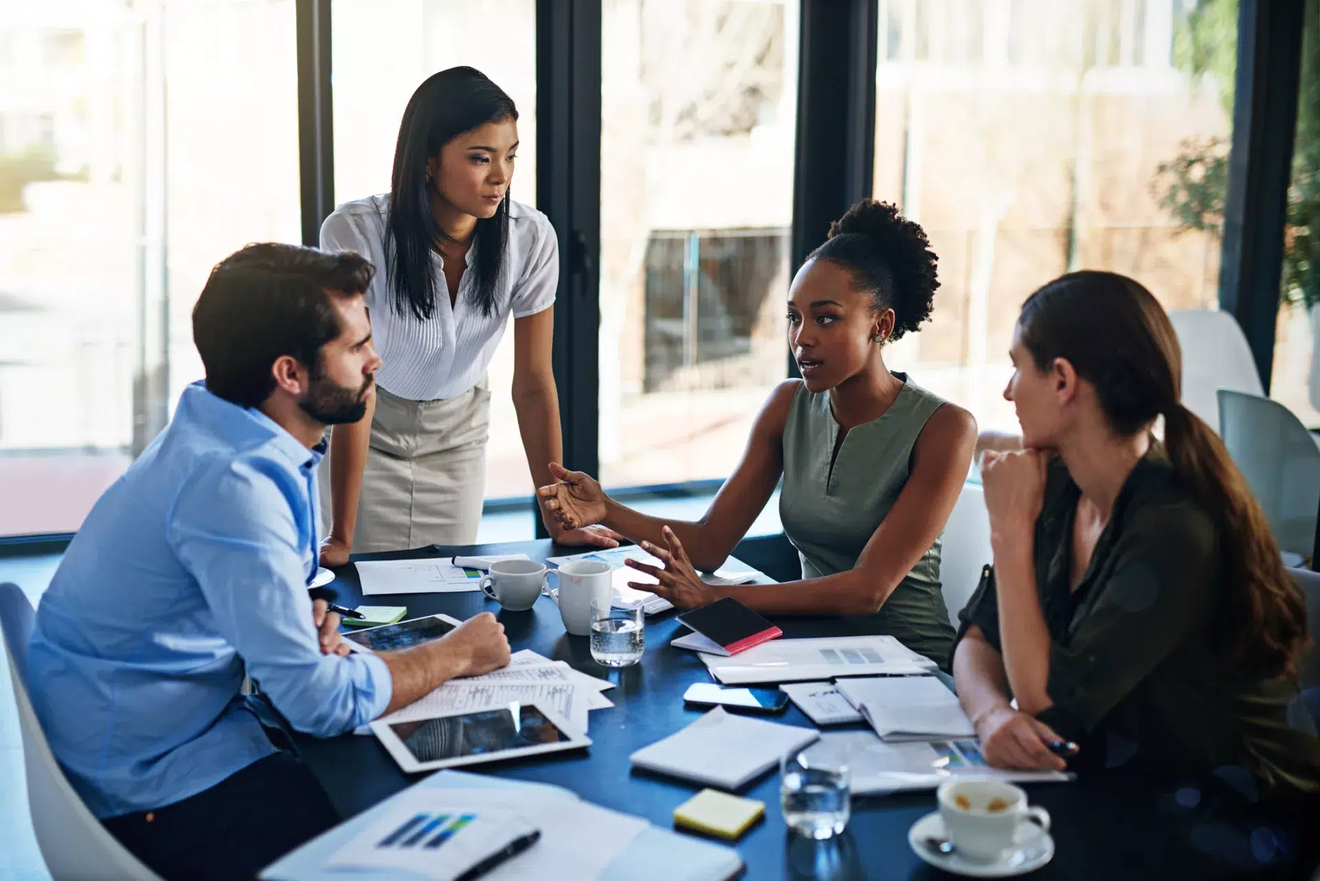 A small group of people have a business meeting