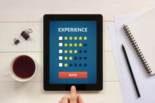 rating app on tablet as part of customer experience tech stack