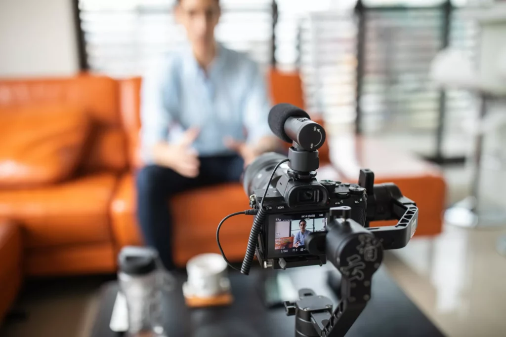 employee filming video for knowledge transfer