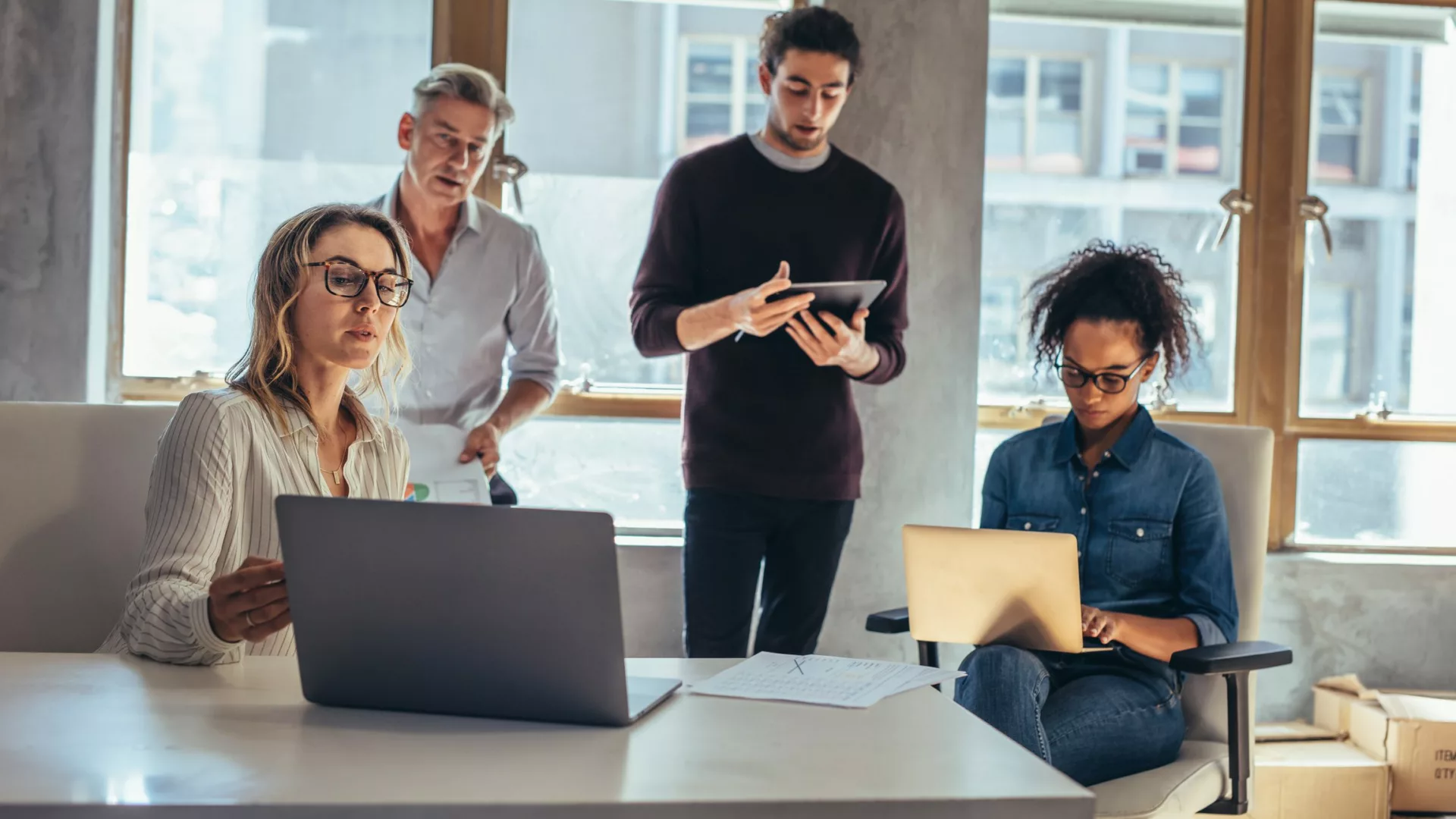 market research and product team collaborate in conference room