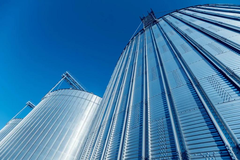 close up of grain silos representing knowledge silos in the workplace||