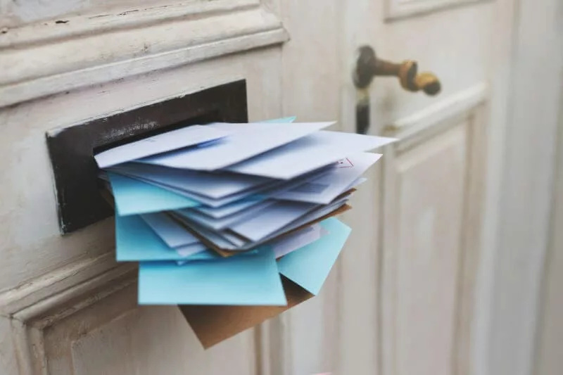 stuffed mail slot representing email overload