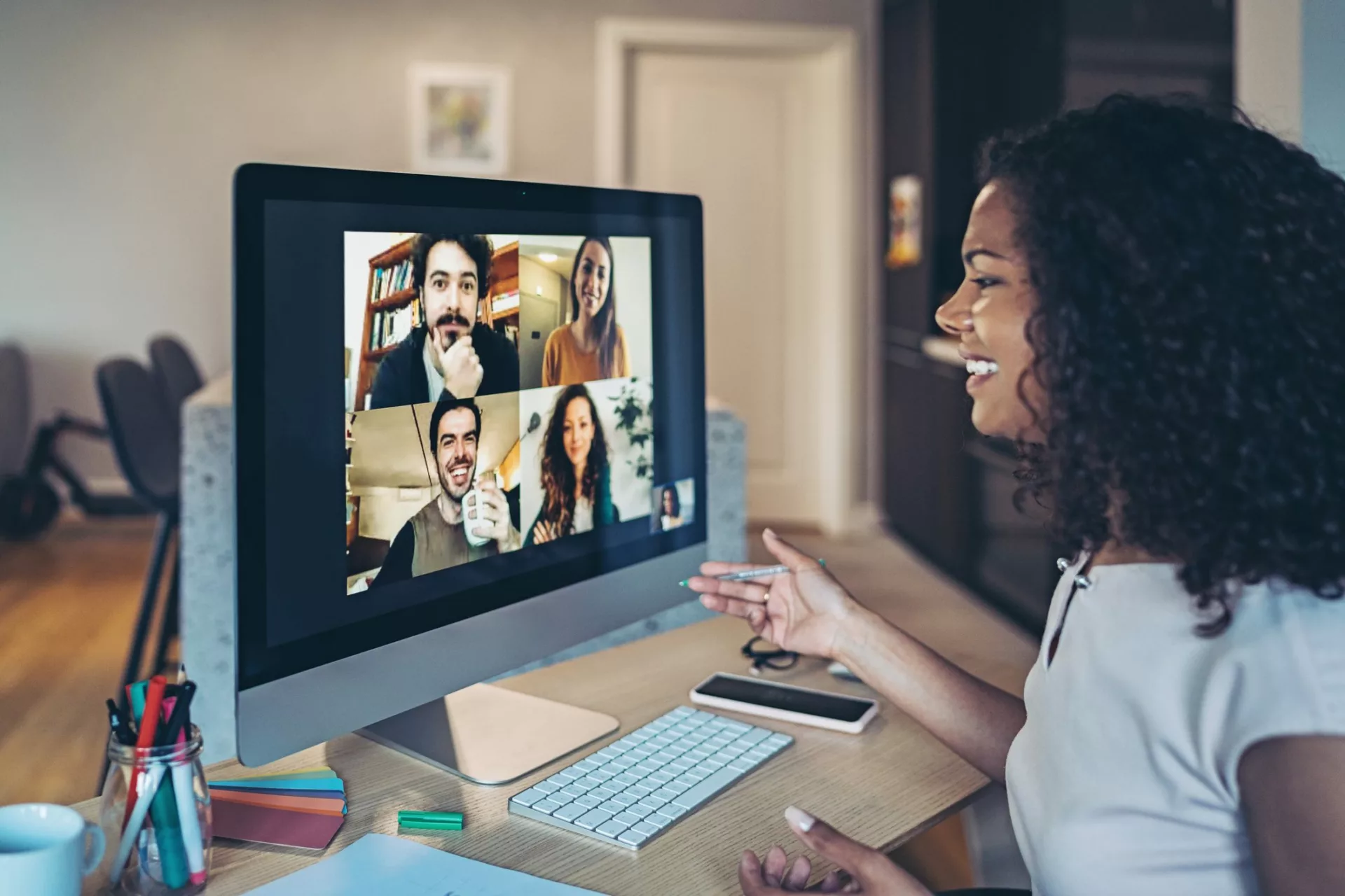 woman on video call at home demonstrates how to work with global teams