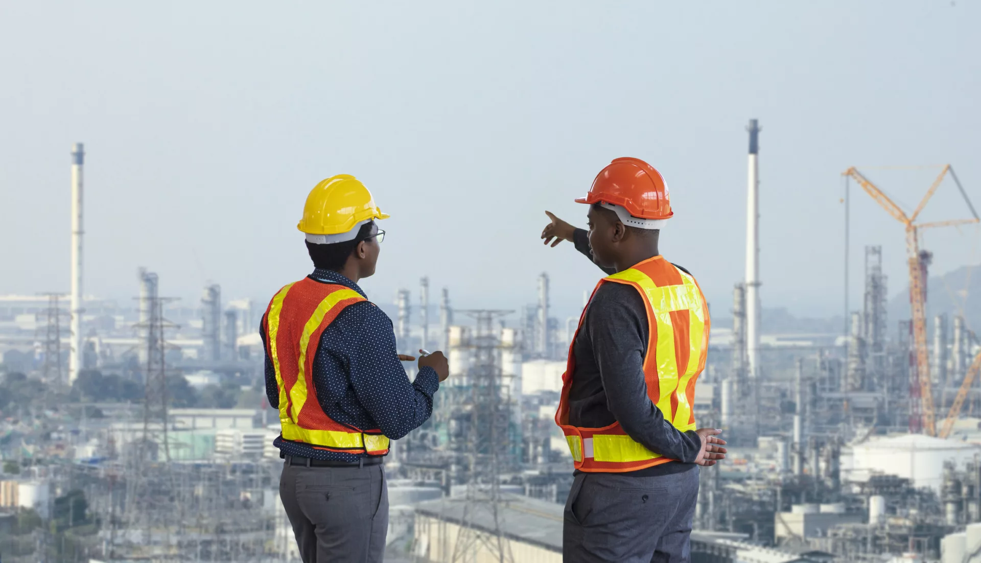 Workers discuss safety culture at an oil refinery