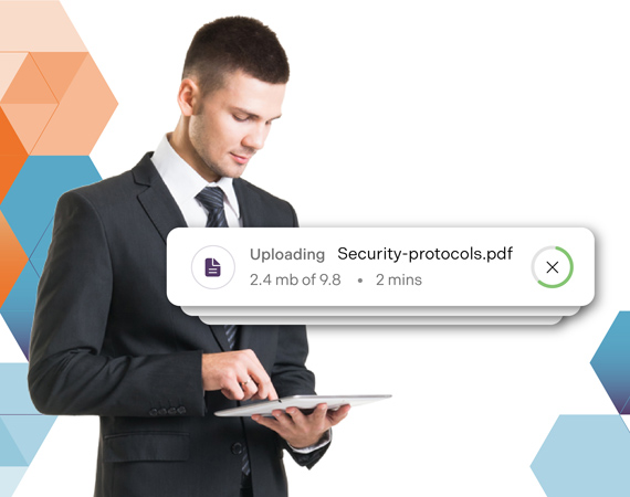 Man holding ipad uploading security protocols