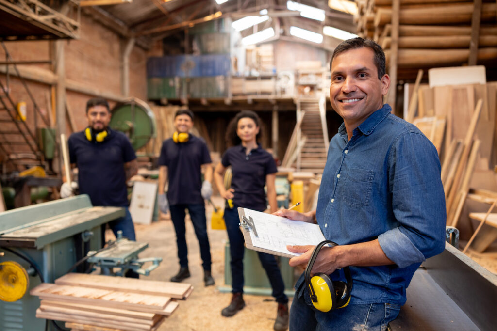 A team of employees working to collaborate on a project
