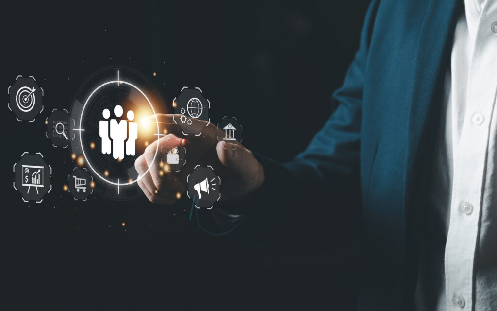 Business professional interacts with a digital interface representing consumer and market insights icons, symbolizing data-driven strategy and growth.