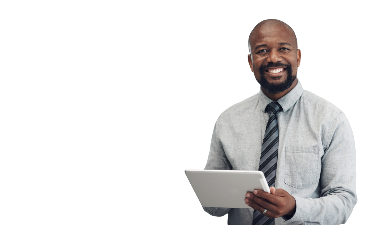 Man smiling in button down shirt and tie, holding a tablet