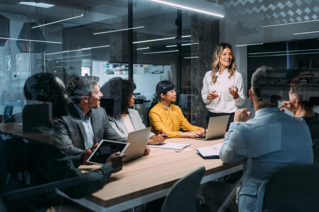 A meeting for IT buy-in facilitated by the enterprise knowledge manager