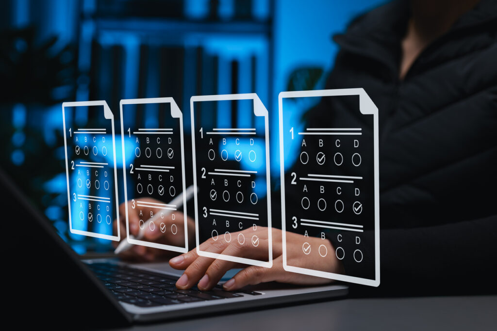 The reflection of the computer screen of an employee performing knowledge checks