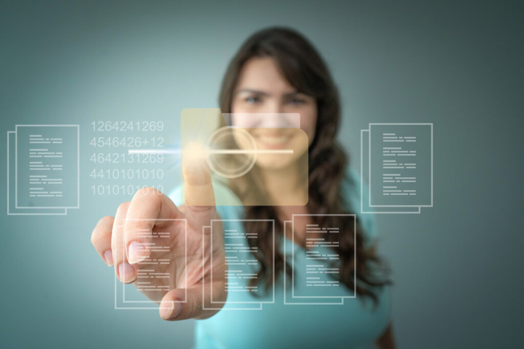 A woman answering what is business digitization by converting manual documents to online, digital knowledge